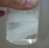 Nylon is forming at the interface between diaminohexane and sebacoyl chloride 