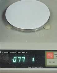 Weigh a samll filter paper with a digital balance.