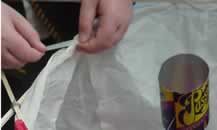 Tape the balloon to the base.