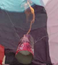The flame goes straight up the inside of the rocket well clear of the sides. Click to see an 80kb movie of the flame.