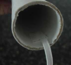 The shock cord is secured one cm inside the body tube