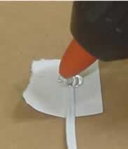 Glueing the shock cord.