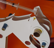 Attaching the hydraulics to the jaw. CLick to see a 120kb movie of its operation