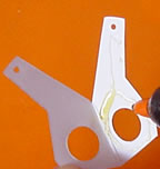The base attachment is carefully folded and glued in two.
