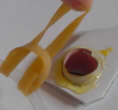 Inserting the elastic band.